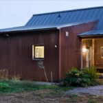 GO Home by GO Logic 1,000 ft² plan B model prefab passive house ADU showing entry porch and exiterior front view.